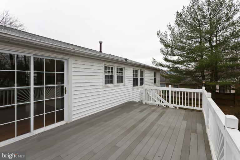 412 Haverhill Road Joppa, MD 21085 - Photo 16 of 20 a view of a deck with wooden floor and fence