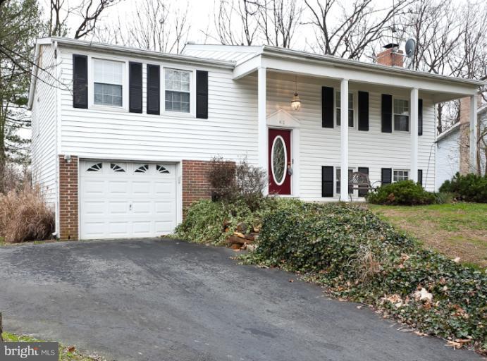 412 Haverhill Road Joppa, MD 21085 - Photo 20 of 20 a front view of a house with a yard and garage