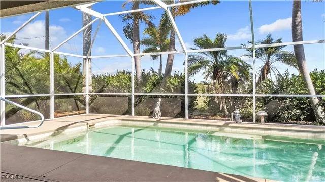 a view of a house with a swimming pool