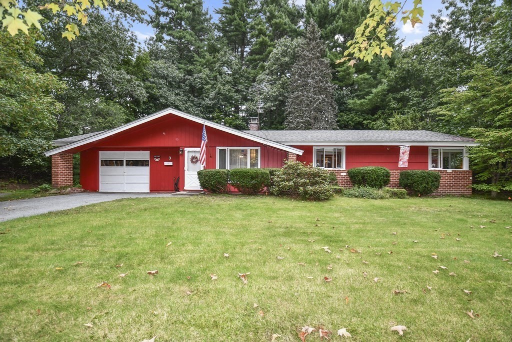 3 Clarissa Road Chelmsford, MA 01824 - Photo 1 of 15 a view of a yard in front of a house with plants and large tree
