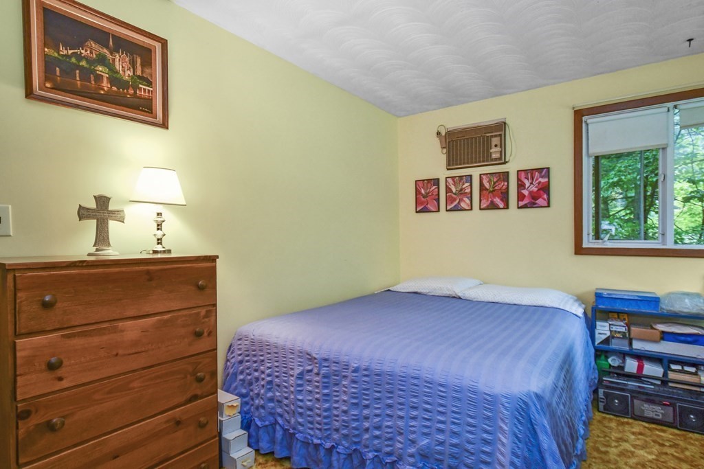 3 Clarissa Road Chelmsford, MA 01824 - Photo 11 of 15 a bedroom with a bed and a dresser