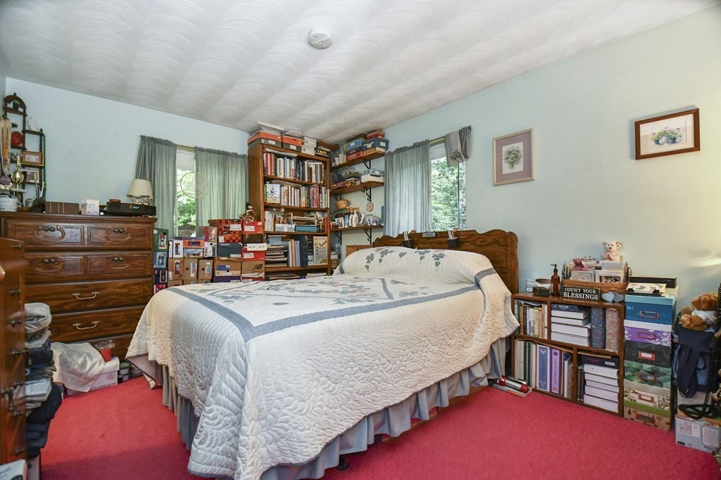 3 Clarissa Road Chelmsford, MA 01824 - Photo 12 of 15 a bed room with a bed and a dresser