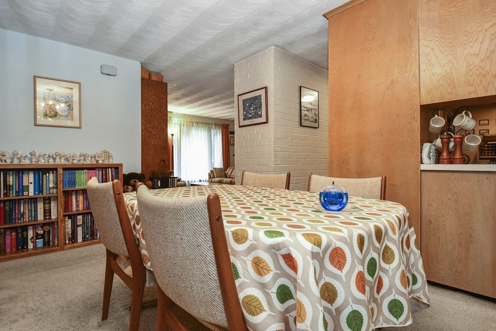 3 Clarissa Road Chelmsford, MA 01824 - Photo 7 of 15 a bedroom with furniture and a book shelf