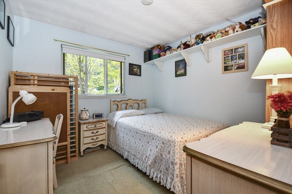 3 Clarissa Road Chelmsford, MA 01824 - Photo 10 of 15 a bedroom with bed and a window