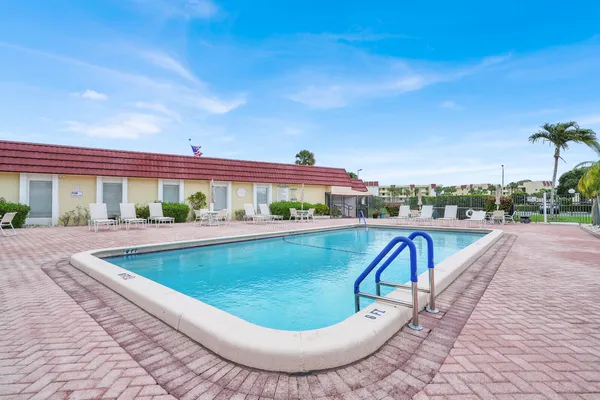 a view of an outdoor space and tennis court
