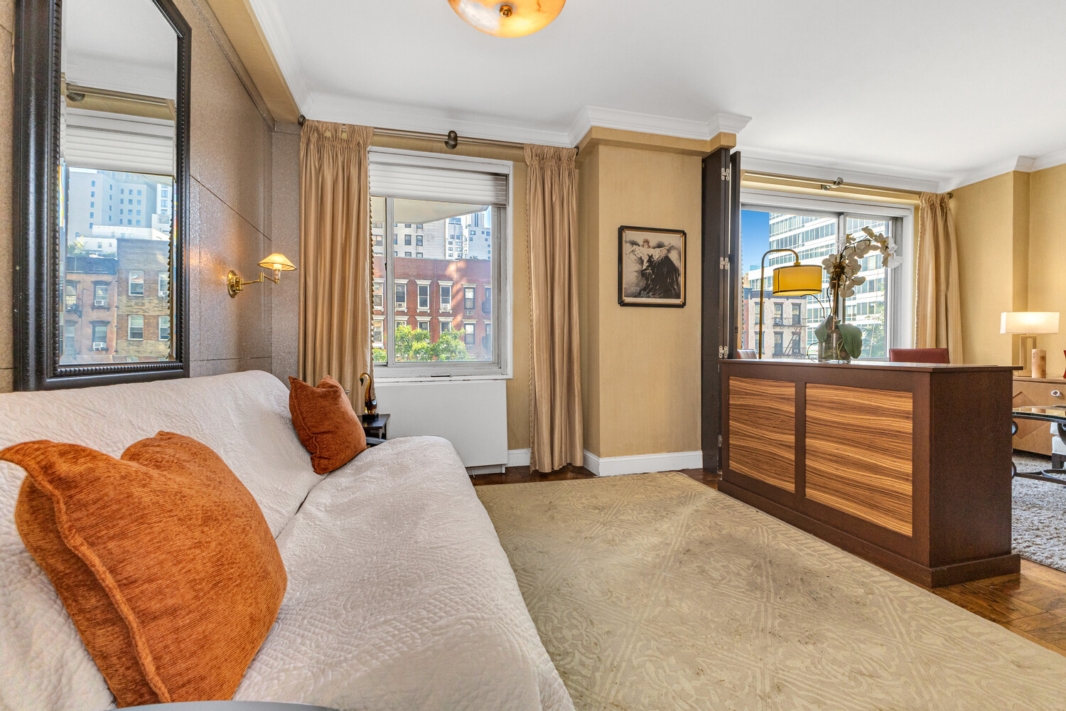 300 East 74th Street, Unit 3CC Manhattan, NY 10021 - Photo 7 of 13 a bedroom with furniture and a window