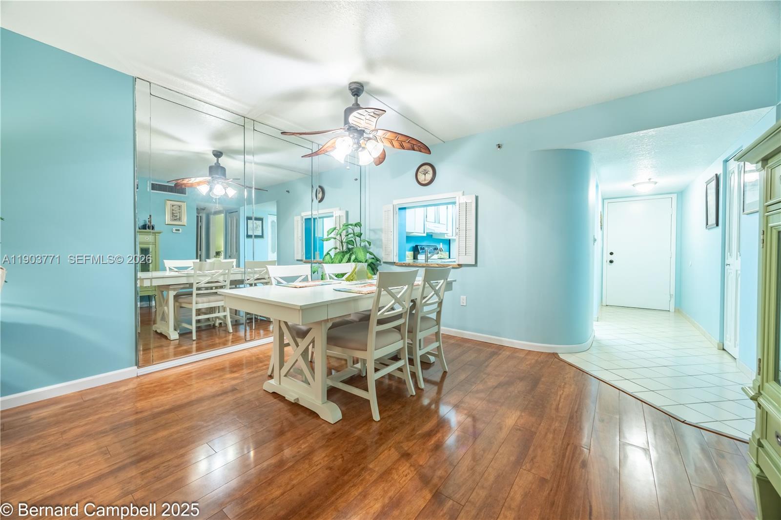 3910 Inverrary Boulevard, Unit 406B Lauderhill, FL 33319 - Photo 13 of 22 a view of a dining room with furniture window and wooden floor