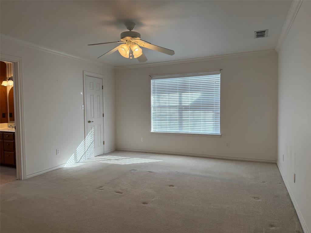150 Timberidge Lake Road Graham, TX 76450 - Photo 12 of 25 an empty room with a empty space and a window