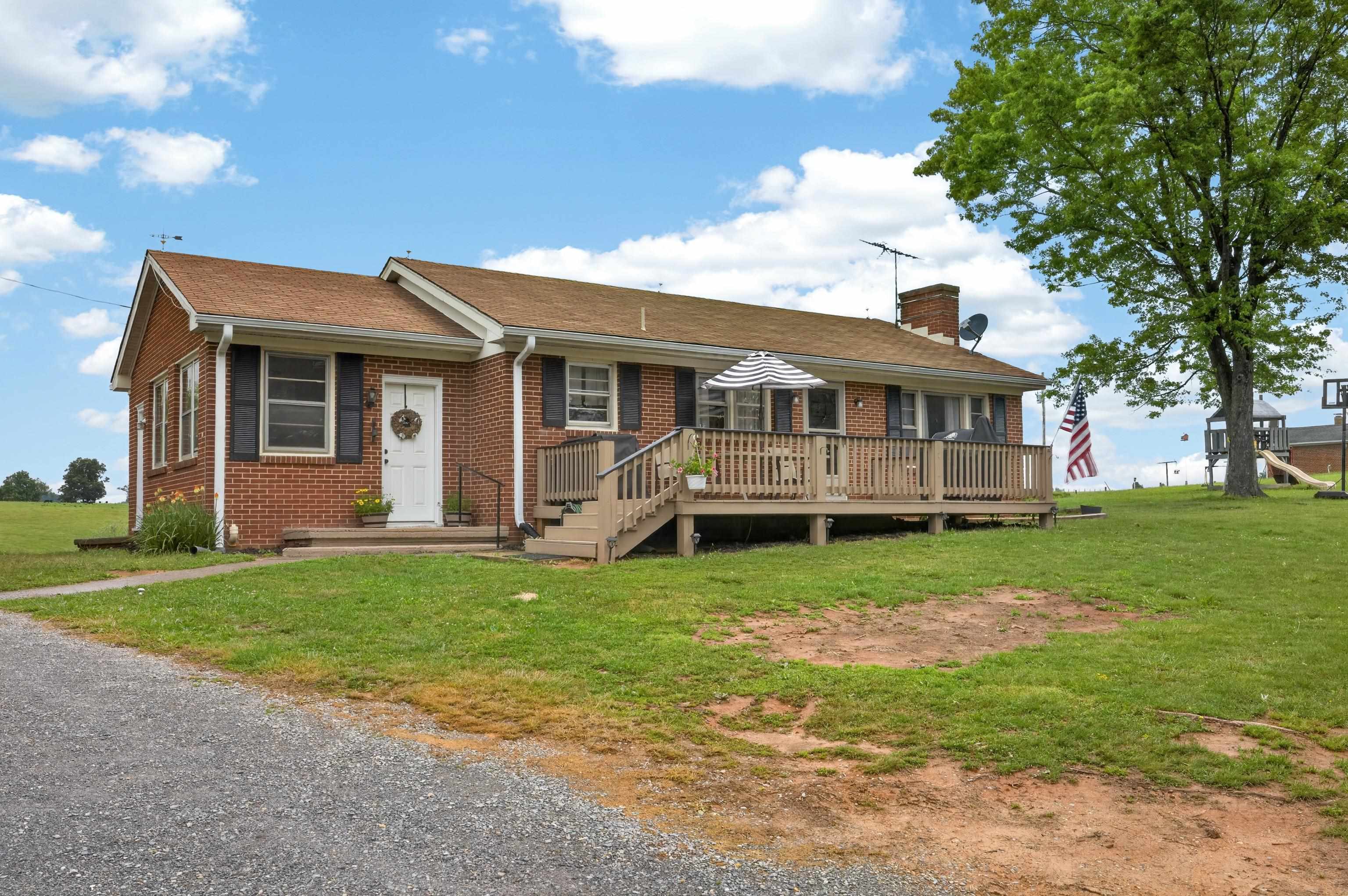 7827 Lee Highway Raphine, VA 24472 - Photo 4 of 62 a view of a house with a backyard