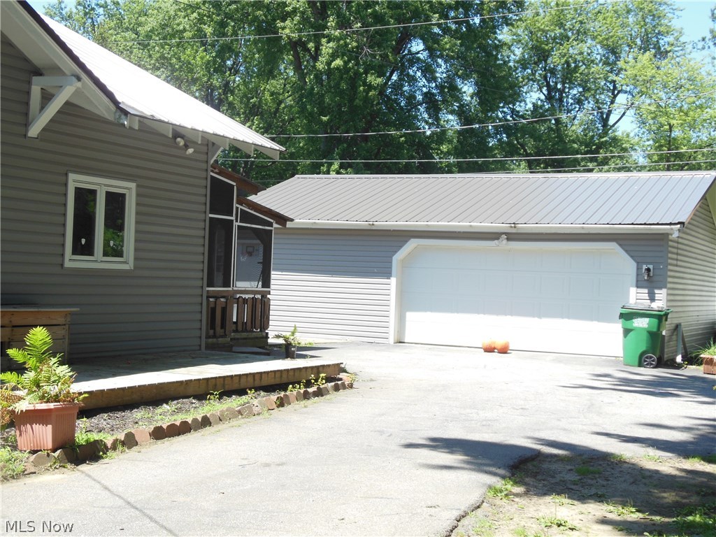 6197 Chapel Road Madison, OH 44057 - Photo 5 of 29 3 car garage also got a metal roof this spring!