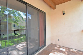 2750 Plumas Street, Unit 201 Reno, NV 89509 - Photo 15 of 34 a view of a glass door and a yard
