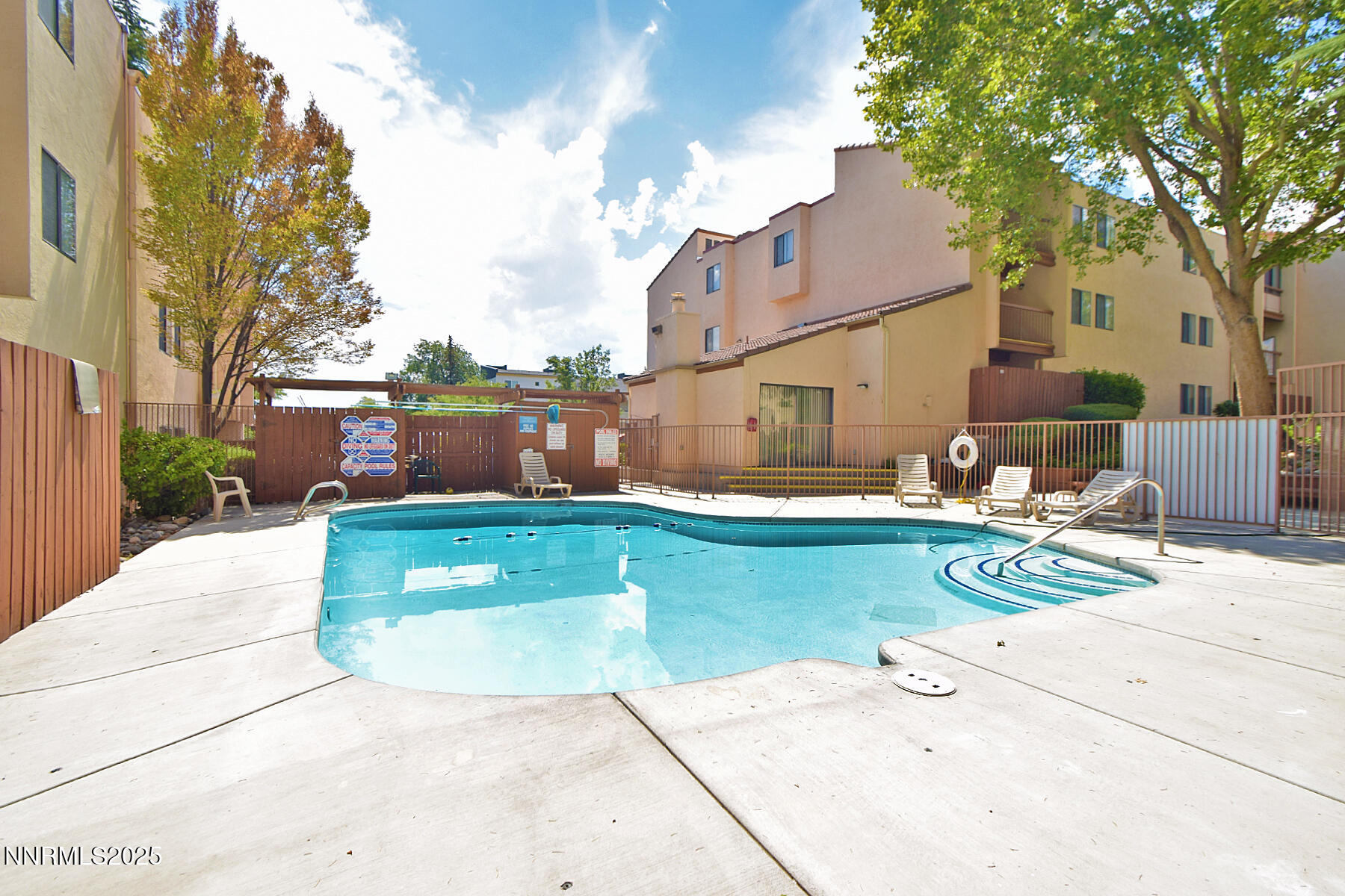 2750 Plumas Street, Unit 201 Reno, NV 89509 - Photo 19 of 34 a view of a house with swimming pool
