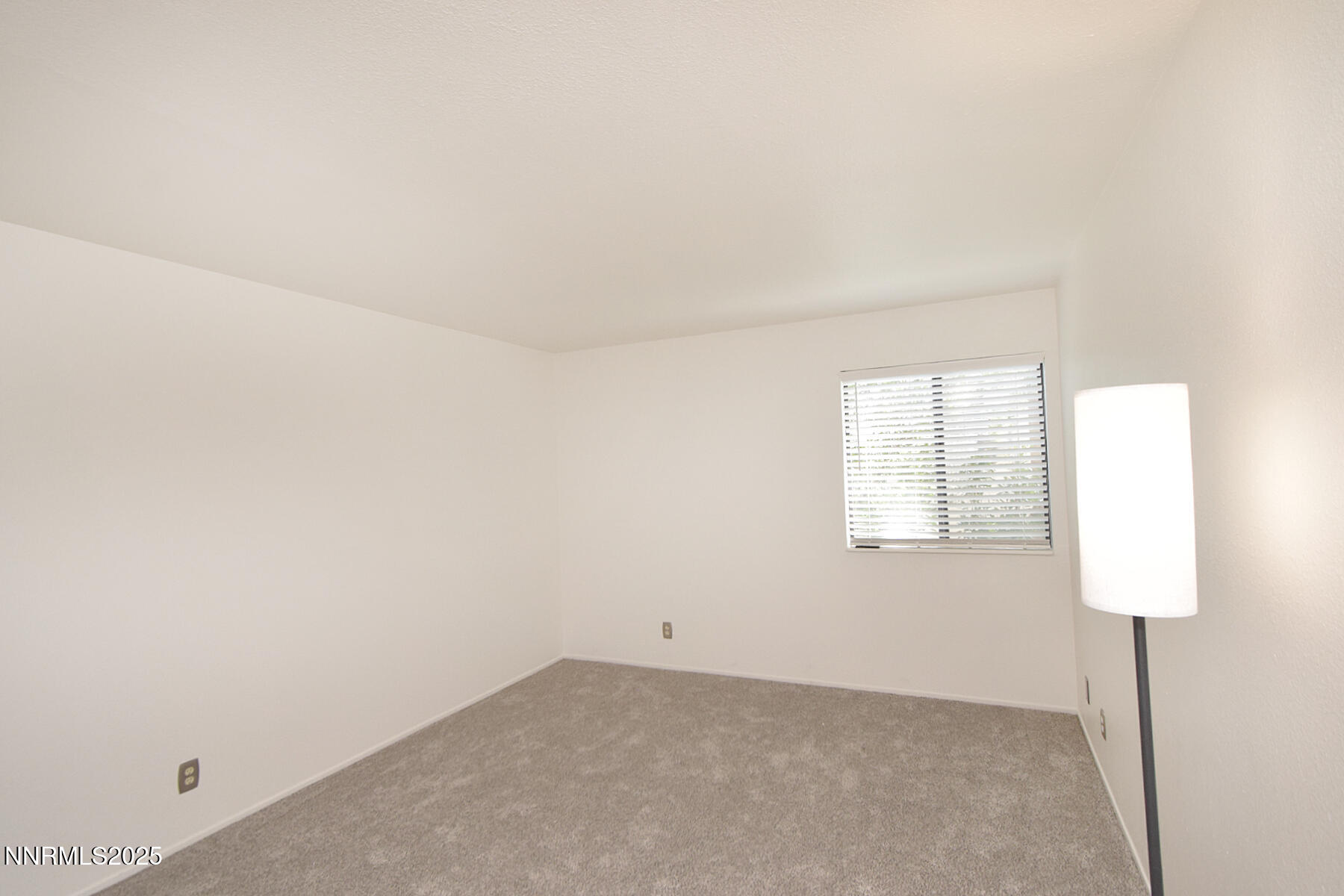2750 Plumas Street, Unit 201 Reno, NV 89509 - Photo 24 of 34 a view of an empty room and a window