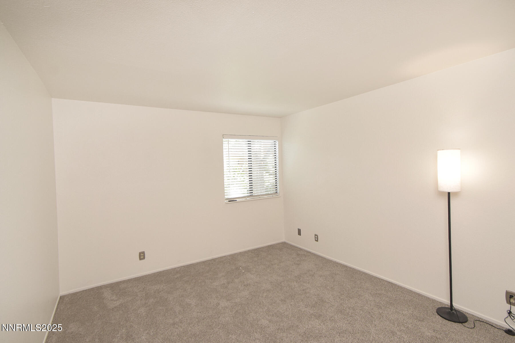2750 Plumas Street, Unit 201 Reno, NV 89509 - Photo 26 of 34 an empty room with a fan