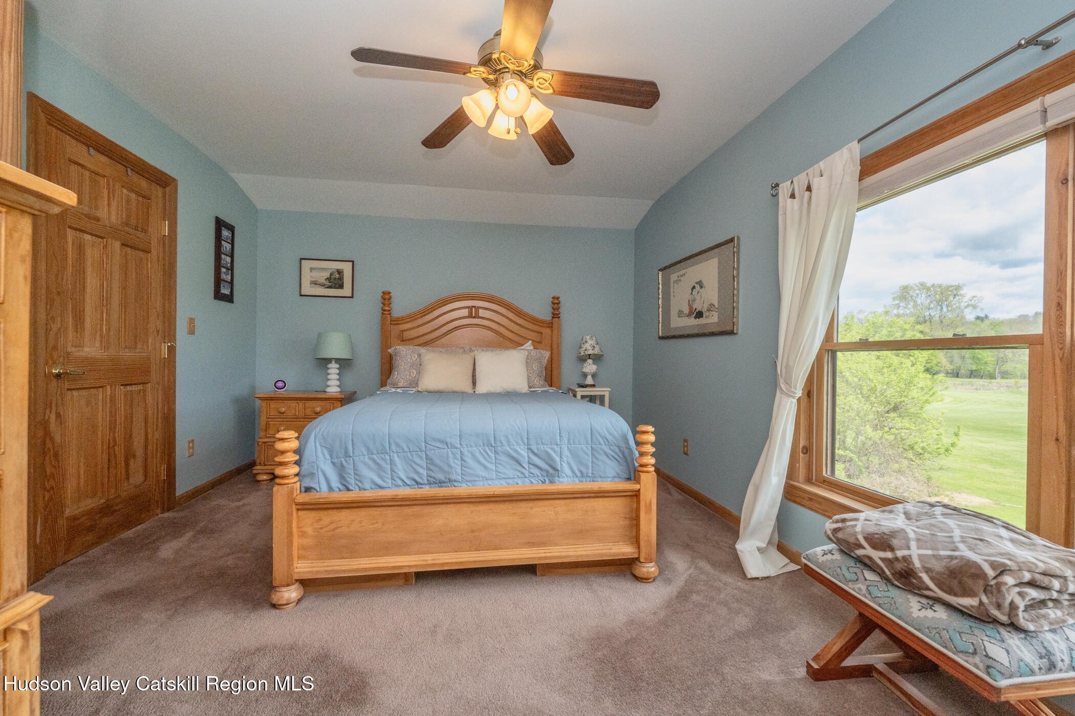 140 Stone Dock Road High Falls, NY 12440 - Photo 22 of 42 a bedroom with a bed and a window