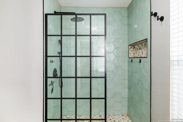 a view of a bathroom with a window