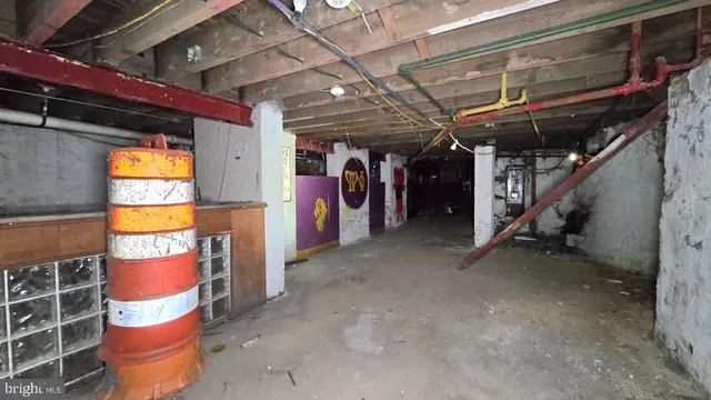 a view of an empty room with a fireplace