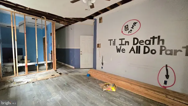 a bathroom with a sink and cabinets