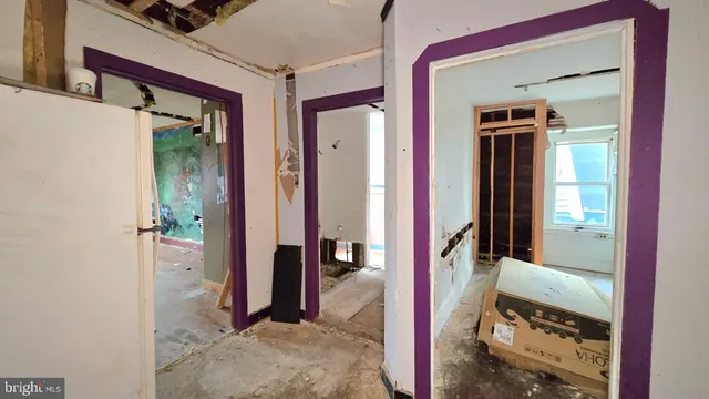 a bathroom with a tub and sink