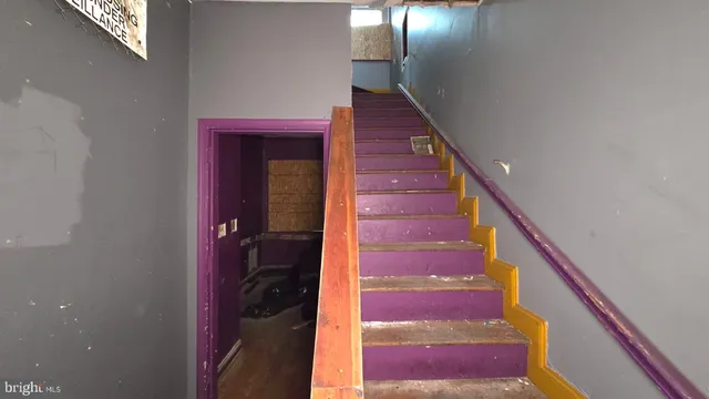 a bathroom with a shower and a mirror
