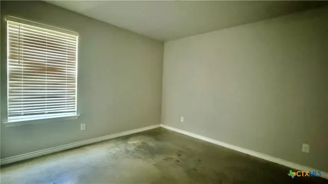 an empty room with a window