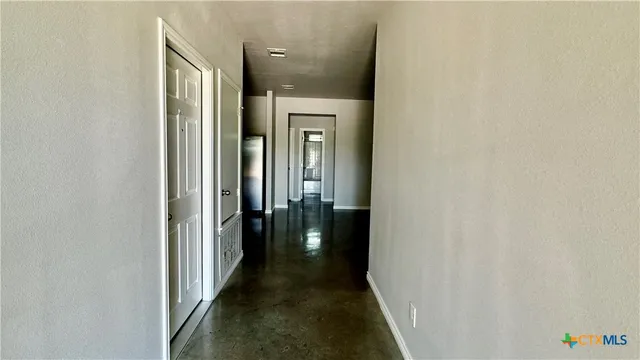a view of a hallway with a elevator
