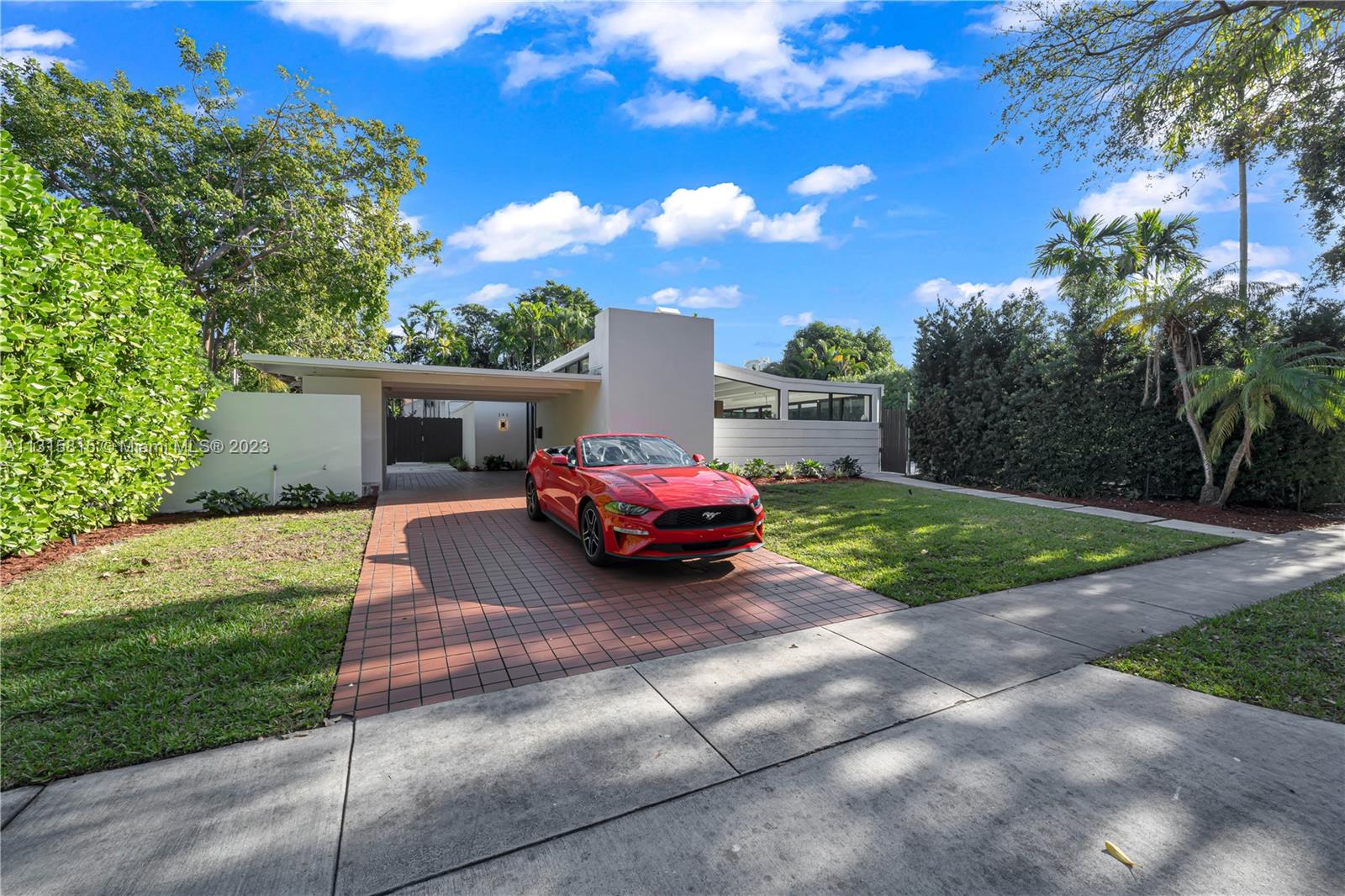 141 Southwest 24th Road Miami, FL 33129 - Photo 2 of 58 a view of a house with backyard