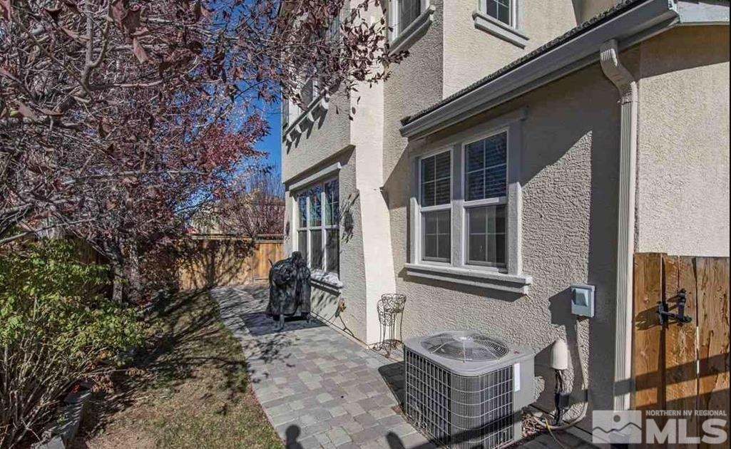 6923 Sacred Circle Sparks, NV 89436 - Photo 4 of 16 a view of a house with a yard