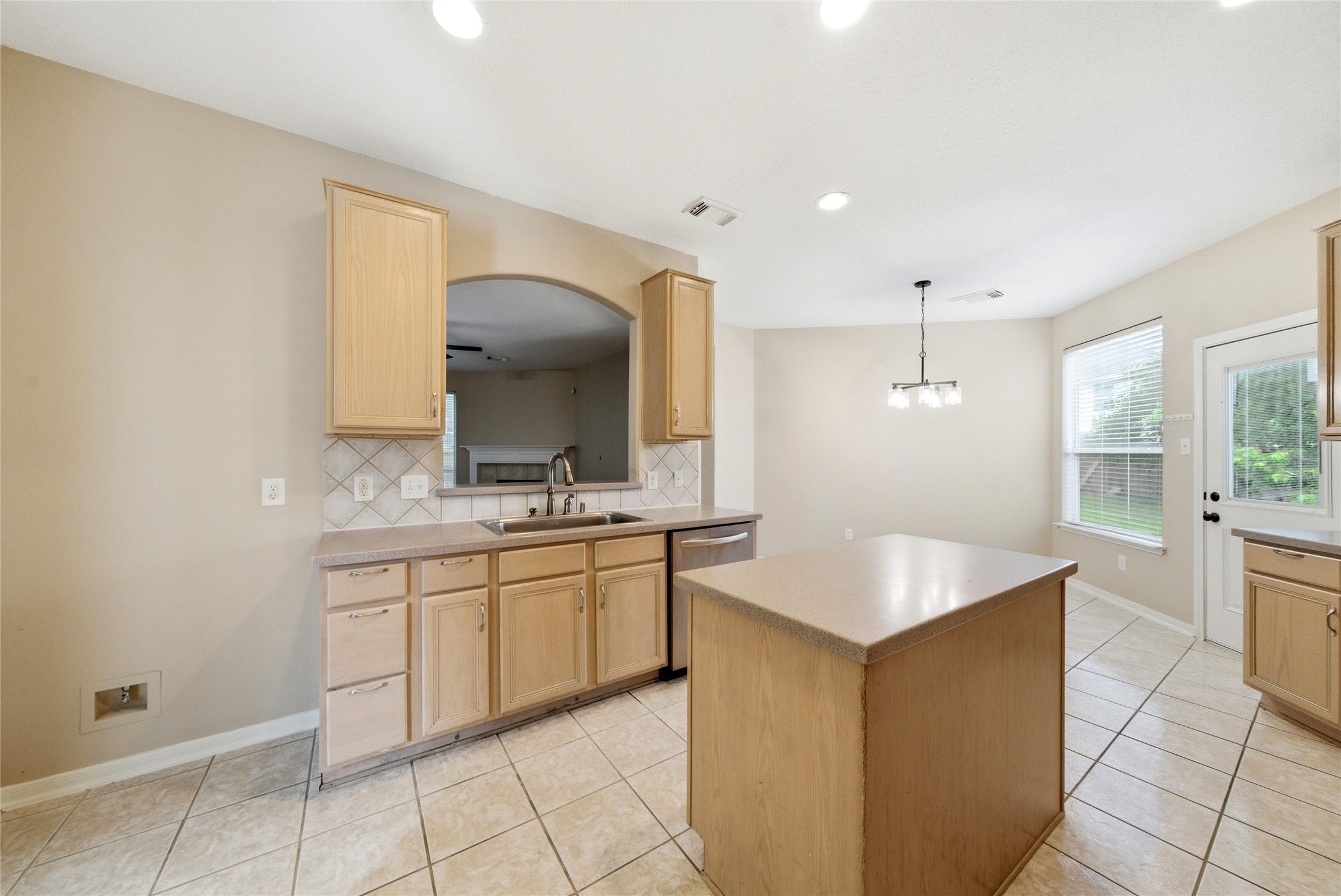 3711 Slocom Drive Katy, TX 77449 - Photo 13 of 46 a kitchen with granite countertop a sink and a stove