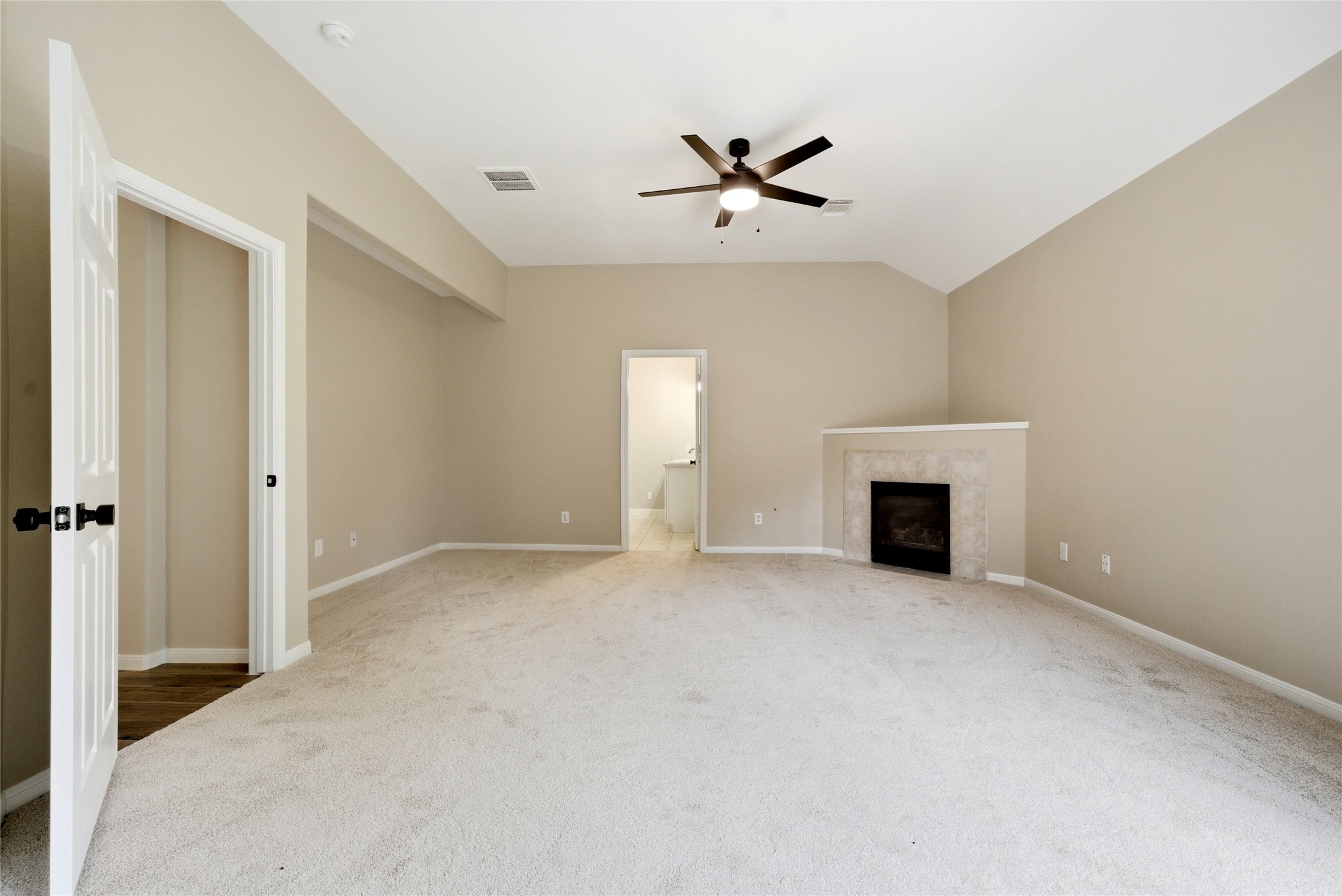 3711 Slocom Drive Katy, TX 77449 - Photo 22 of 46 a view of an empty room with a fireplace