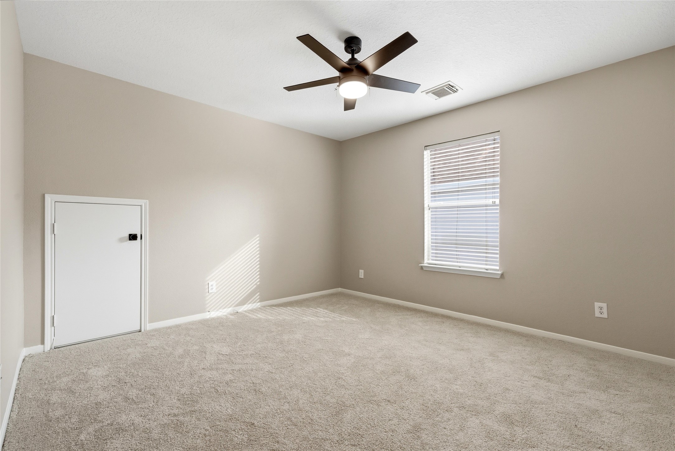 3711 Slocom Drive Katy, TX 77449 - Photo 31 of 46 a view of a livingroom with a ceiling fan and window