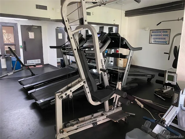 a view of a room with gym equipment