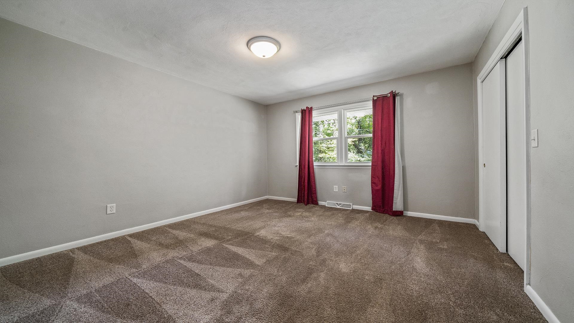 3691 South Bend Road Rockford, IL 61109 - Photo 12 of 34 a view of an empty room with a window