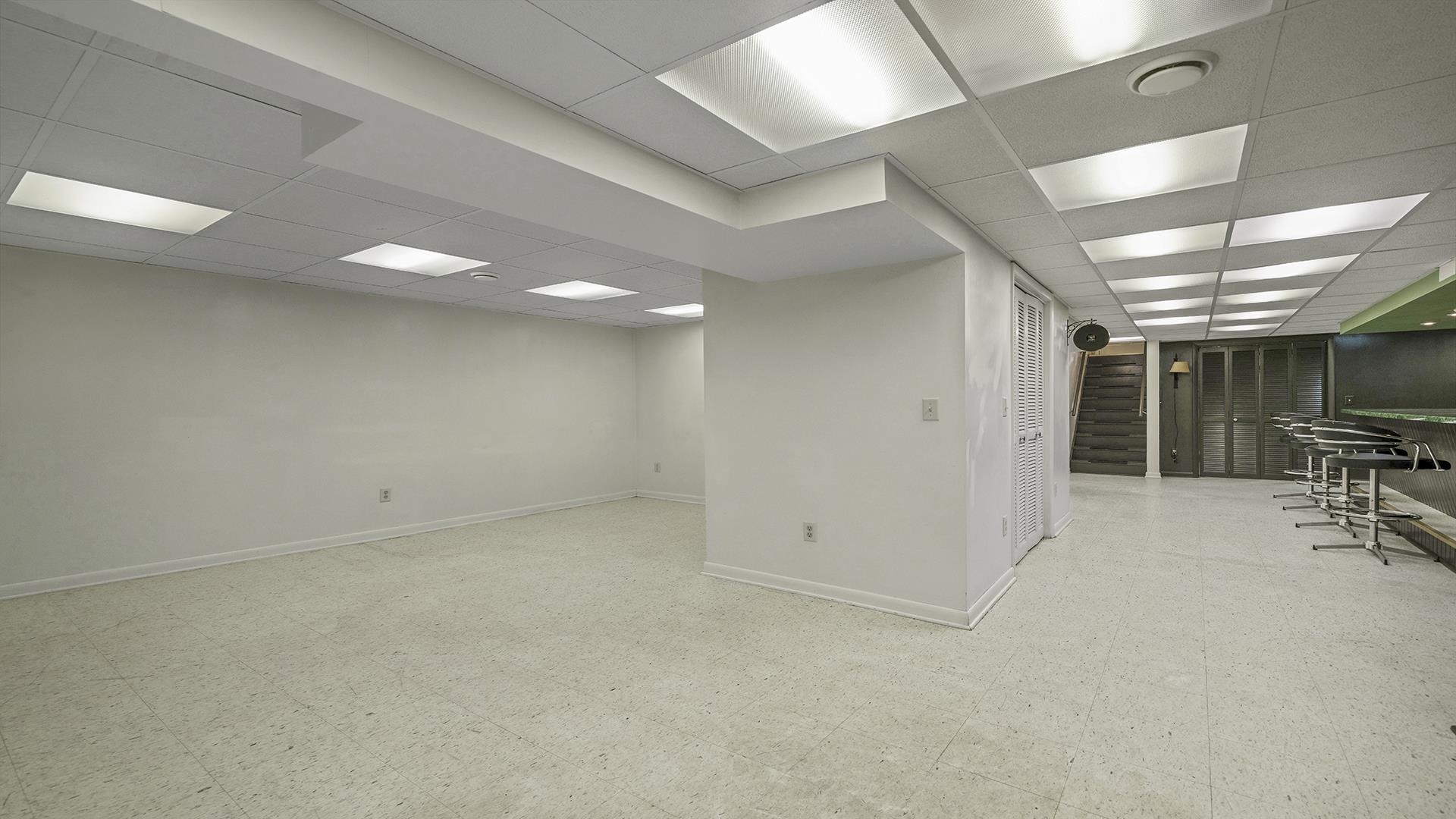 3691 South Bend Road Rockford, IL 61109 - Photo 23 of 34 an empty room with wooden floor and windows