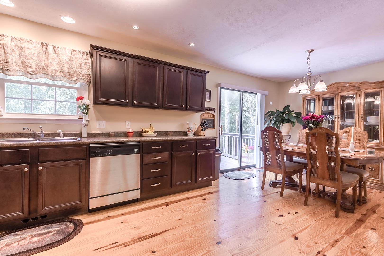 7574 King Road Fairview, TN 37062 - Photo 15 of 30 a kitchen with lots of counter top space and dining table