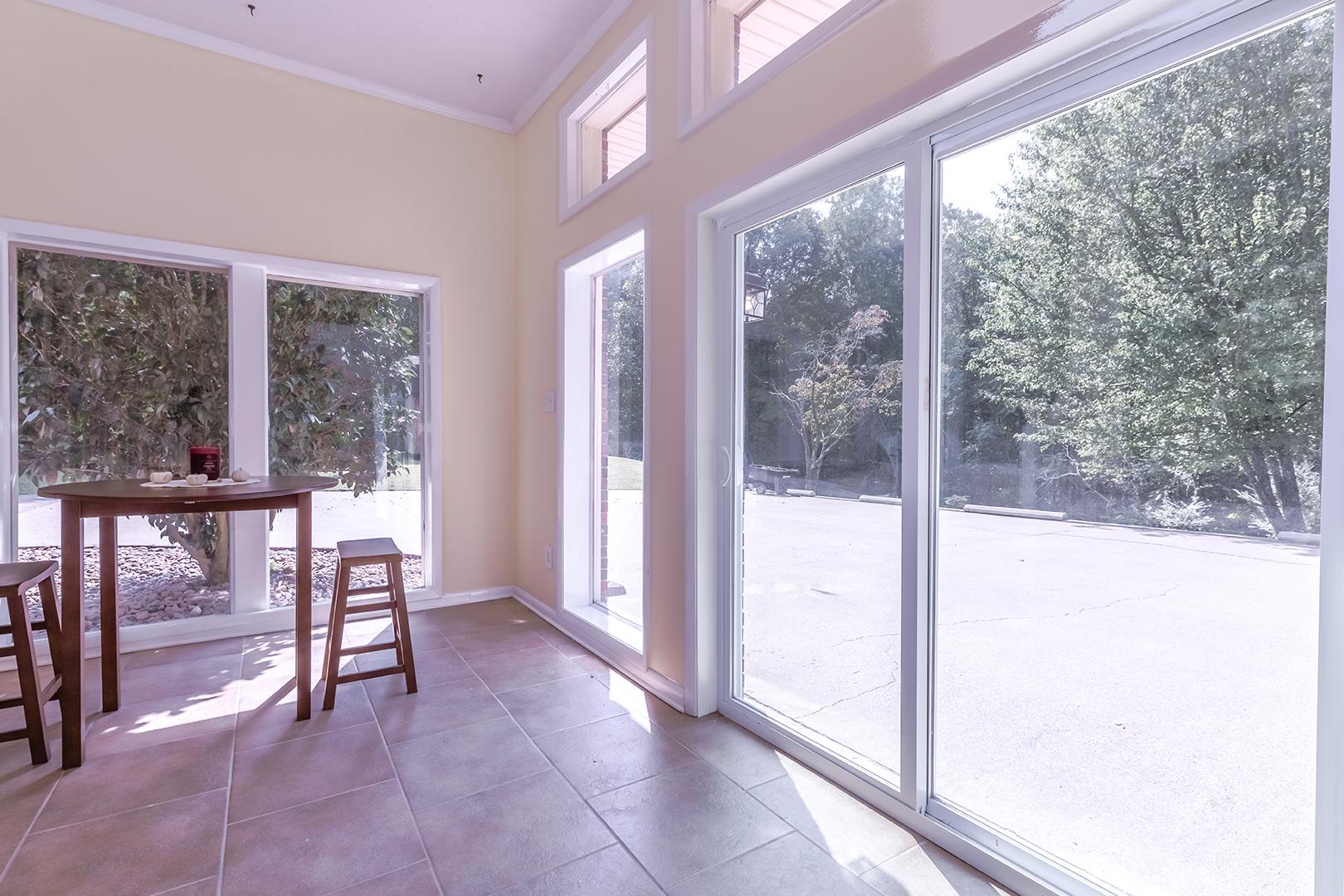 7574 King Road Fairview, TN 37062 - Photo 20 of 30 a view of a room with a large window and chairs