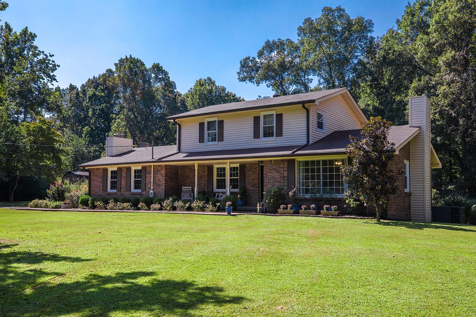 7574 King Road Fairview, TN 37062 - Photo 3 of 30 a front view of a house with garden