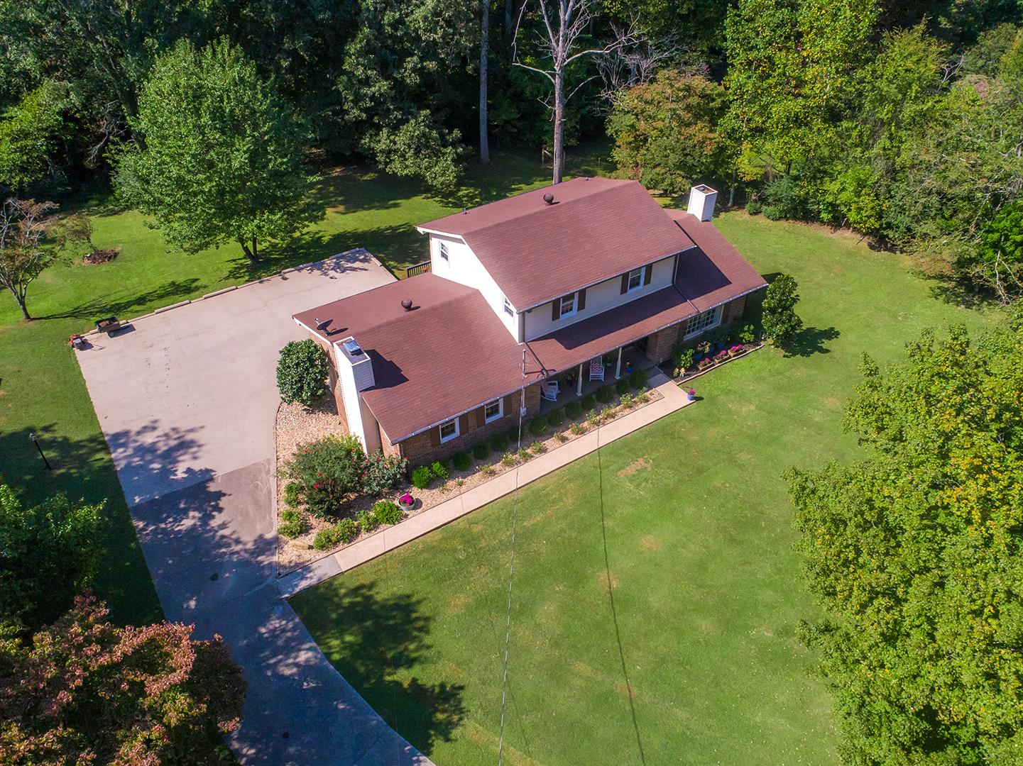 7574 King Road Fairview, TN 37062 - Photo 27 of 30 an aerial view of a house with swimming pool and garden