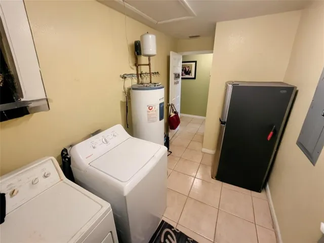a view of a workspace with furniture
