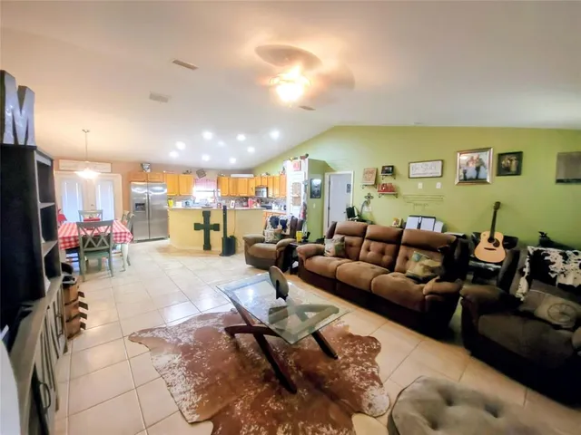 a living room with furniture and a table
