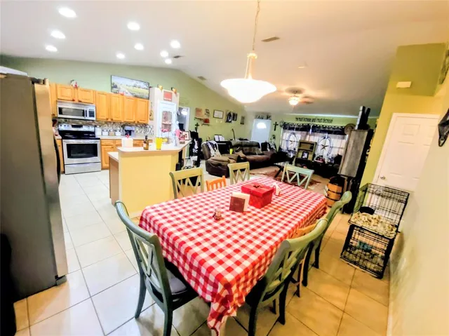 a view of a dining room with furniture