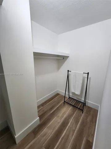 a view of wooden floor and chair