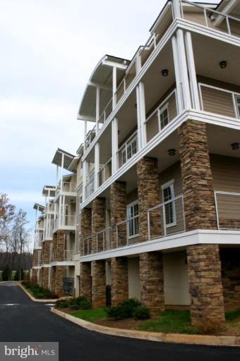1801 Berry Ridge Drive, Unit 240 Culpeper, VA 22701 - Photo 7 of 16 a large building with a large window