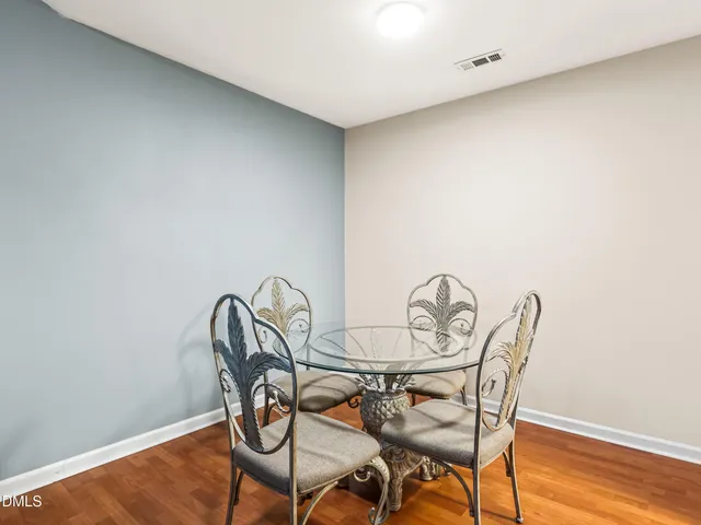a view of a porch with furniture and a window