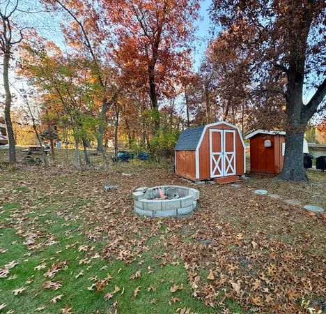 a backyard of a house with lots of green space
