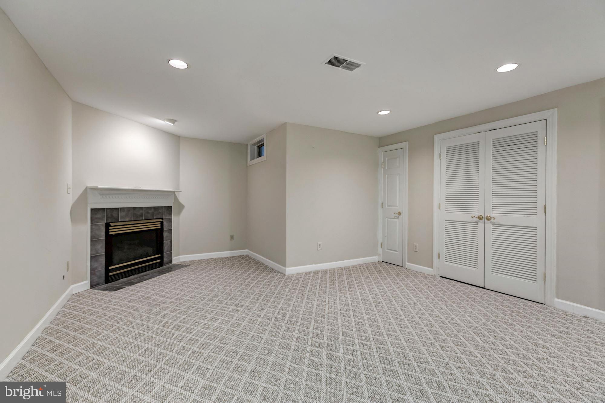 3645 Ransom Place Alexandria, VA 22306 - Photo 23 of 30 Rec Room with Gas Fireplace