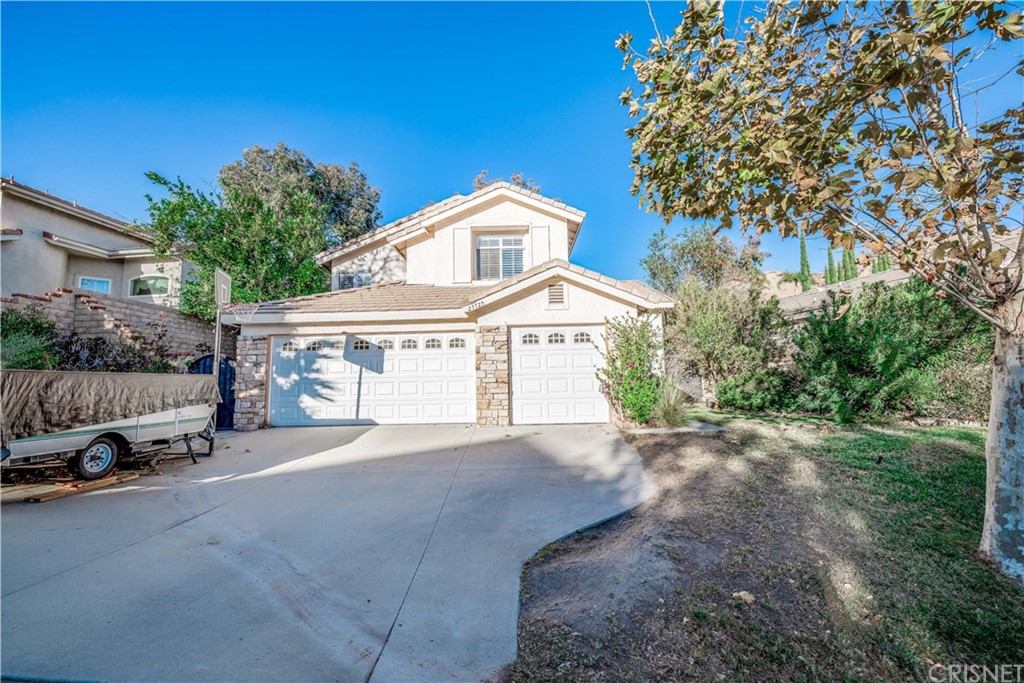 27725 Villa Canyon Road Castaic, CA 91384 - Photo 1 of 1 Front of home - 3 Car Garage and wide driveway
