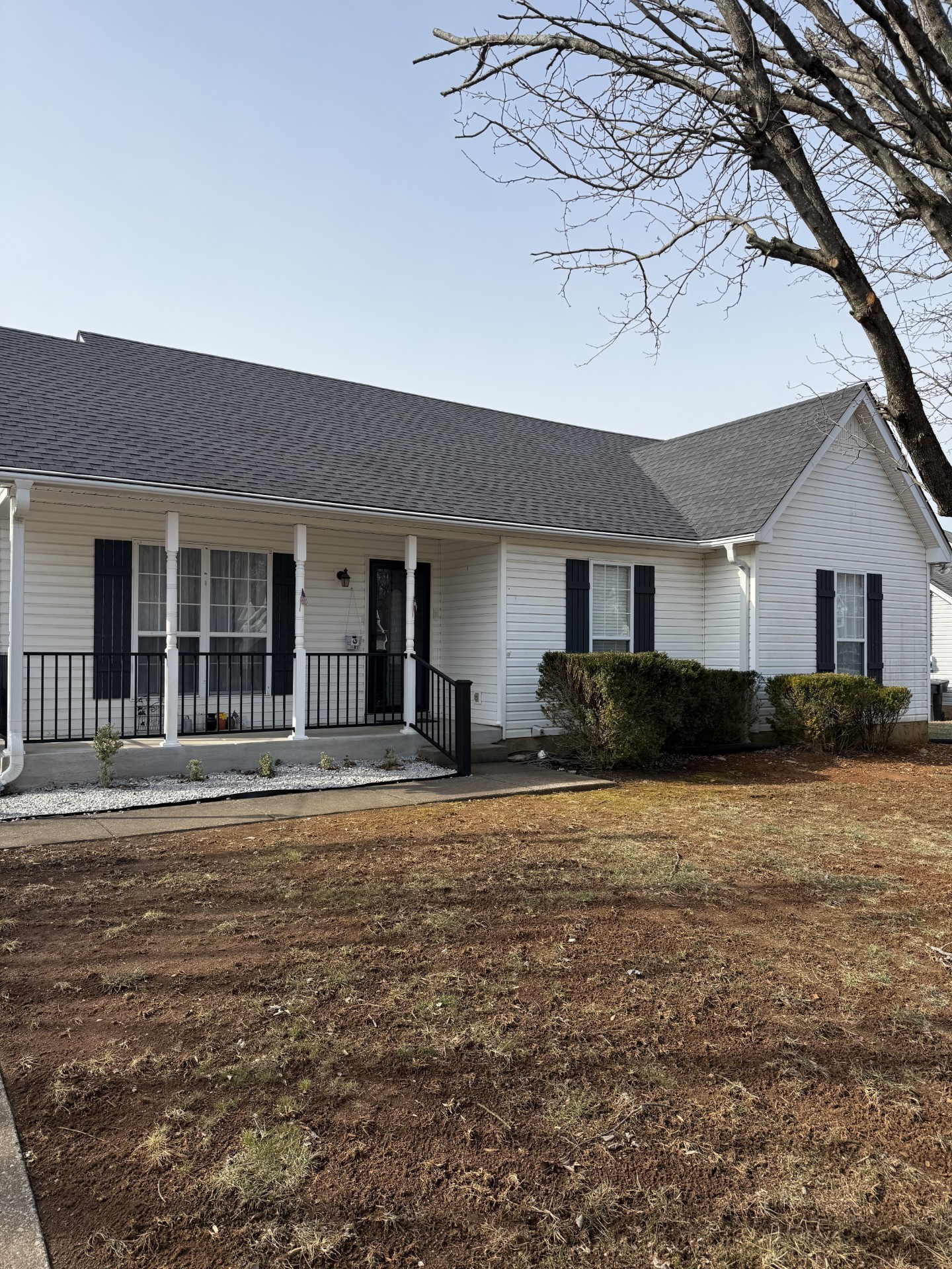 2719 Rocking Horse Lane Murfreesboro, TN 37130 - Photo 1 of 2 a front view of a house with a garden