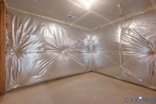 a view of a backyard with wooden fence