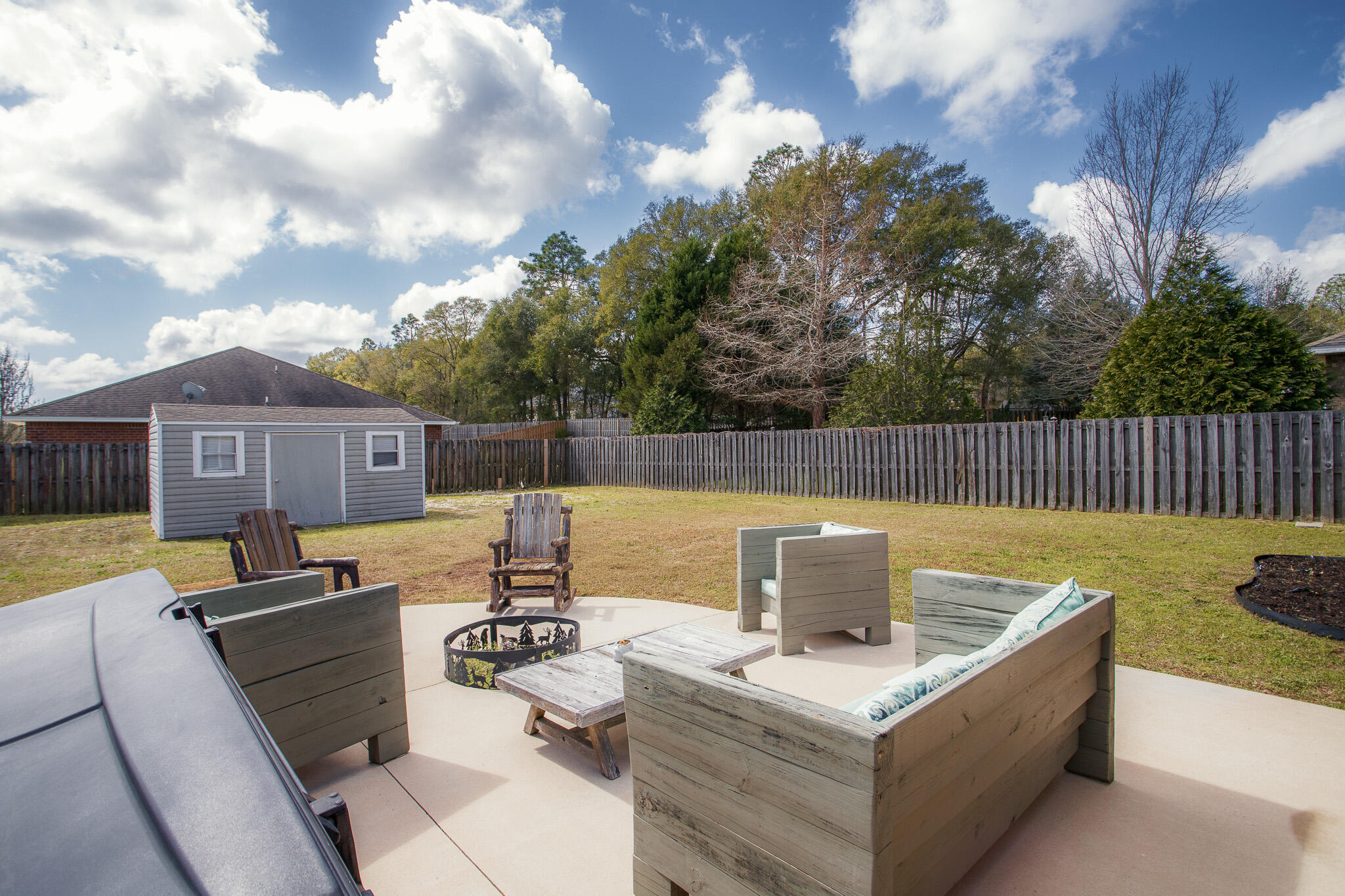 2233 Lewis Street Crestview, FL 32536 - Photo 16 of 24 a view of a couches and a table in the patio